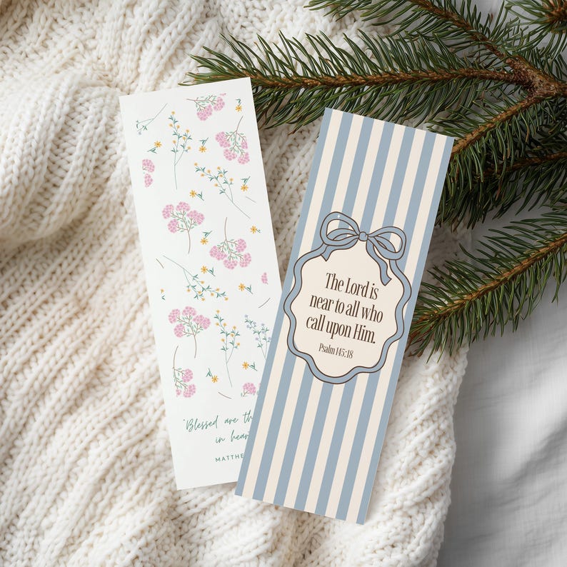 May include: Two decorative bookmarks. One features pink floral sprigs on a white background. The other has blue and white vertical stripes with a bow and the text "The Lord is near to all who call upon Him." Psalm 145:18.