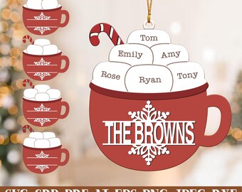 May include: A red wooden Christmas ornament shaped like a mug of hot chocolate, with marshmallows and a candy cane. The ornament is personalized with the family name "THE BROWNS" and individual names.