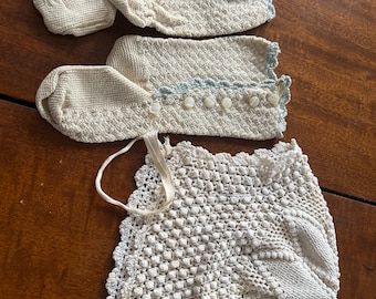 Hand crocheted vintage baby clothes