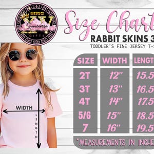 May include: A young girl wearing a light pink t-shirt, with a size chart for toddler t-shirts. The chart shows measurements in inches for sizes 2T to 7. The t-shirts are Rabbit Skins 3321 fine jersey.