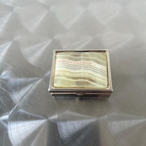 Pillbox stone decoration