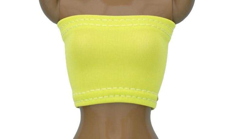 May include: A bright yellow tube top with white stitching around the edges.