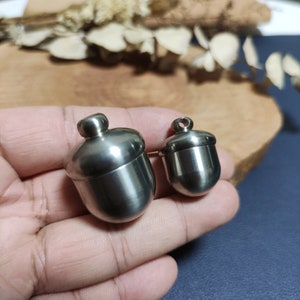 100% titanium, eikelsleutelhanger, kettinghanger, verzegelde waterdichte pillendoos, askettinghanger, creatieve pillendoos