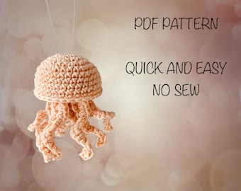 No sew jellyfish keychain crochet pattern. Beginner friendly, quick and easy amigurumi.