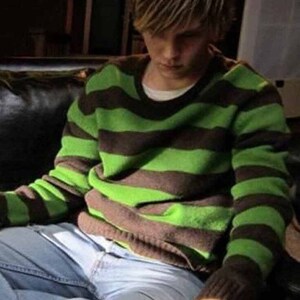 Black and green striped sweater 2025