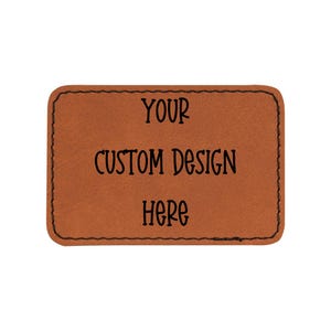 May include: A brown leather patch with the text "YOUR CUSTOM DESIGN HERE" in black.