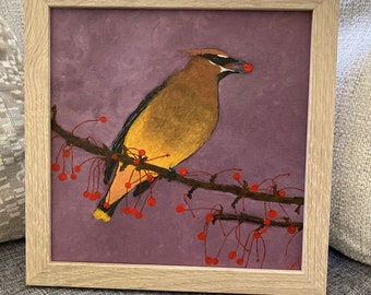 Framed square oil painting - Waxwing bird eating berries on tree branch against purple sky