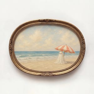 Summerween wall art showing a cute ghost on a sandy beach beside gentle ocean waves in a soft vintage color palette with hand-painted texture.