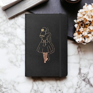 Quaderno con copertina rigida a tema Alice nel paese delle meraviglie