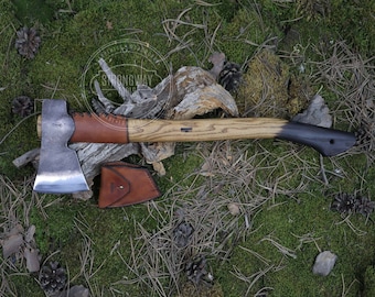 May include: A hand-forged axe with a wooden handle and a leather sheath. The axe head is made of steel and has a sharp edge. The handle is made of wood and has a dark brown finish. The sheath is made of leather and has a brown color.