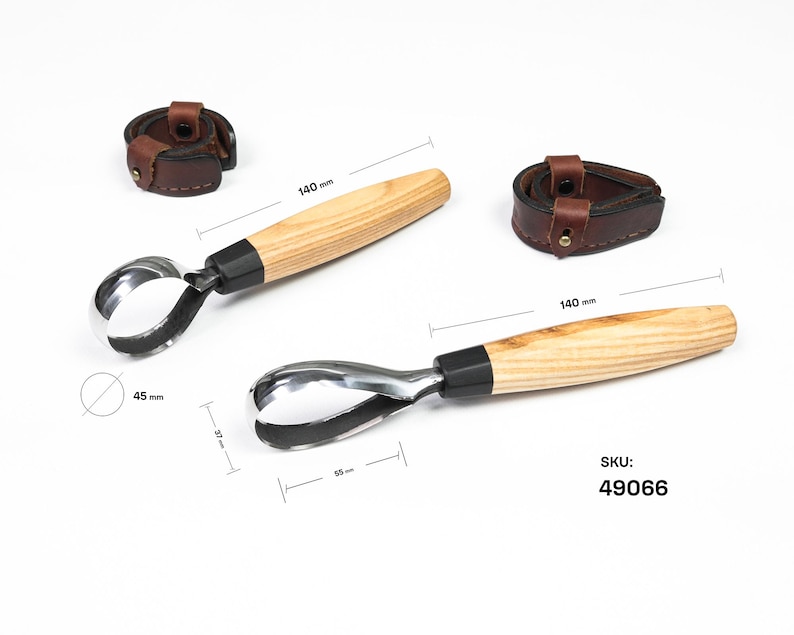 May include: Two wood carving knives with curved blades and wooden handles, each 140 mm long. The blades are silver-colored, and the handles are light brown. Two brown leather sheaths are also included. The SKU is 49066.