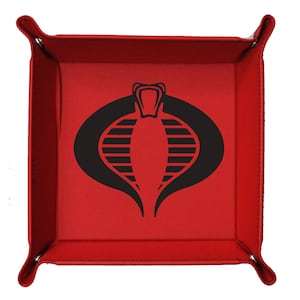 May include: A red, square tray with a black cobra logo in the center. The tray has a raised edge and rounded corners. The cobra logo is a stylized image of a snake's head and hood.