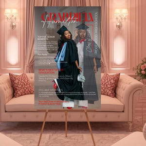 May include: A graduation-themed magazine cover featuring a graduate in a cap and gown. The cover includes the name "Gabriella Hamilton", "Class of 2026", and text about senior moments and future plans. The magazine is displayed on a wooden easel.