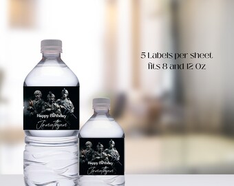 May include: Two clear plastic water bottles with black and white labels. The labels feature a photo of soldiers and the text "Happy Birthday Jonathan". The text "5 Labels per sheet fits 8 and 12 oz" is also visible.