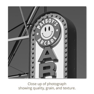 A close-up detail of a Black and white photograph of a vintage arcade sign on the Wildwood, NJ Boardwalk.