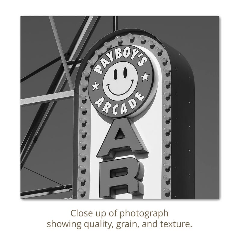 A close-up detail of a Black and white photograph of a vintage arcade sign on the Wildwood, NJ Boardwalk.
