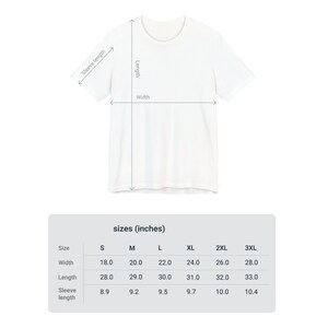 May include: Size chart for a t-shirt in sizes S through 3XL. The chart shows measurements in inches for width, length, and sleeve length.
