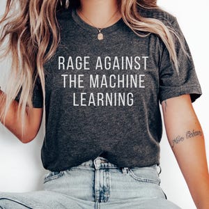 Rage Against The Machine Learning T-Shirt Unisex, Pun T Shirt for Women in STEM, Funny AI Joke Tee, Techie Hacker Gift, Dark Humor Tech Geek