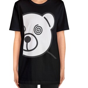 May include: Black t-shirt with a white graphic of a bear's face with a spiral in one eye.