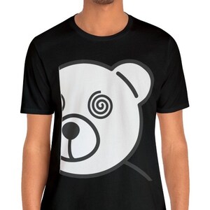May include: Black t-shirt with a white outline of a bear's head with a spiral in one eye.