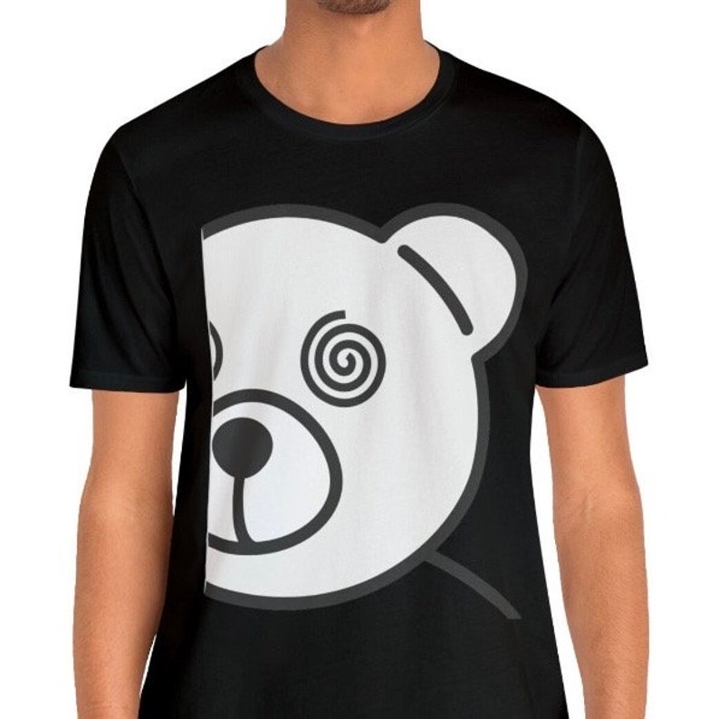 May include: Black t-shirt with a white outline of a bear's head with a spiral in one eye.