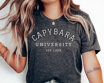 Camiseta de la Universidad de Capybara, camiseta divertida para estudiantes universitarios para mujeres hombres camiseta linda, broma peculiar novedad humor camiseta de la Universidad de Capybara