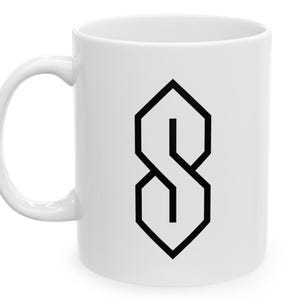 May include: White ceramic mug with a black stylized "S" shape design.
