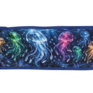 May include: A rectangular fabric runner featuring a vibrant underwater scene with multiple translucent, glowing jellyfish. Each jellyfish is shaped like a computer mouse, with long, dangling USB cables serving as tentacles in shades of blue, green, pink, and gold.