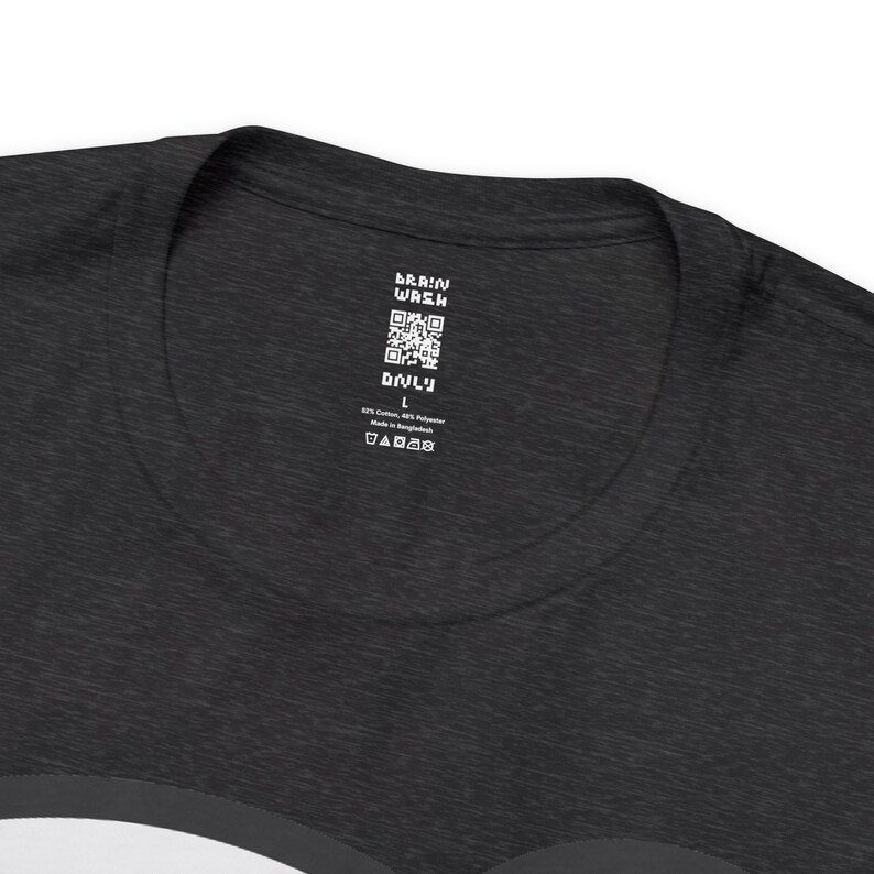 May include: A black t-shirt with a white tag that says "Brain Wash" and has a QR code. The tag also says "Only" and "L" for size. The tag also includes care instructions.