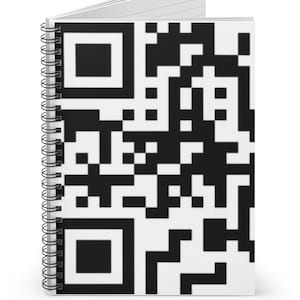 May include: A black and white spiral bound notebook with a QR code on the cover.