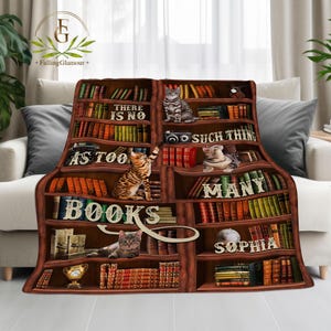 May include: A brown bookshelf with a quote about books and cats. The quote reads "There is no such thing as too many books". There are several cats sitting on the shelves, and the bottom shelf says "Sophia".
