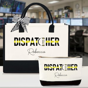 May include: A white tote bag and matching zippered pouch with black accents. The tote features black handles and a striped bow. Both items display the word "DISPATCHER" in black with a yellow stripe and the name "Rebecca".