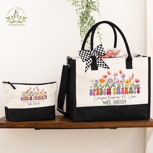 May include: A canvas tote bag and matching cosmetic bag. Both are white with a black base and handles. The bags feature a floral design and the text "SPEECH THERAPY Everyone Deserves A Voice MRS. BRODY". A black and white checkered bow adorns the tote.