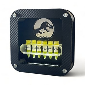 Jurassic Park themed 6 vials of dinosaur embryo with LED backlighting - collectible fan art item