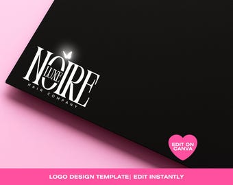 Puede incluir: Una tarjeta de visita negra con el texto blanco "NOIRE LUXE HAIR COMPANY" y un gráfico de mariposa. La tarjeta también presenta un corazón rosa con el texto "EDIT ON CANVA" y el texto "LOGO DESIGN TEMPLATE | EDIT INSTANTLY" en la parte inferior.