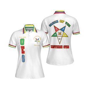 May include: White polo shirt with a colourful collar and trim. The shirt displays the letters "OES" in green, red, and blue, and the words "ORDER OF THE EASTERN STAR" on the back. A star emblem is also present.