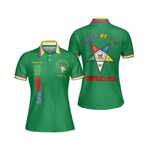May include: Green polo shirt with the text "OES" in red, blue, and green. The shirt features a collar with yellow, red, and blue stripes, and the back displays "ORDER OF THE EASTERN STAR" with a star emblem. The shirt is designed for customization.
