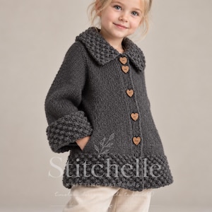 May include: A dark grey knitted cardigan featuring a textured collar and cuffs, long sleeves, and five wooden heart-shaped buttons down the front. The garment has a visible pocket on the side and the text Stitchelle Knitting Patterns is overlaid.