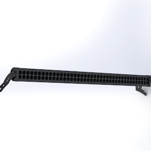 Peut inclure: Une barre de lumière LED noire avec plusieurs lumières rondes. La barre de lumière a deux supports de montage.