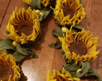 Sunflower Garland for Mayuri. who chooses to look up towards the sun despite her hardships