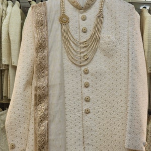Handmade white Sherwani with gold work for Men Find Your Perfect Fit: Tailored Sherwanis Delivered to Your Door