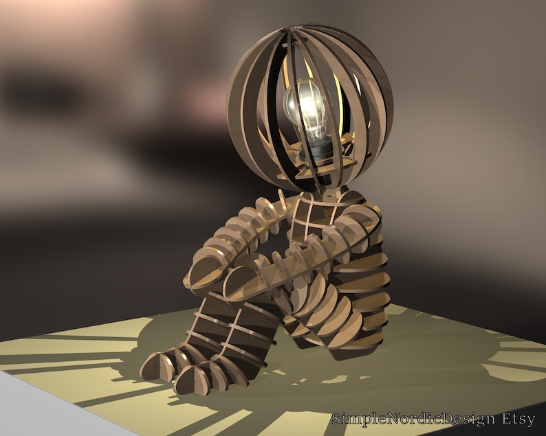 Pantalla de lámpara con figura humana sentada: archivos cortados con láser DXF y SVG