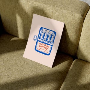 a piece of paper sitting on top of a couch