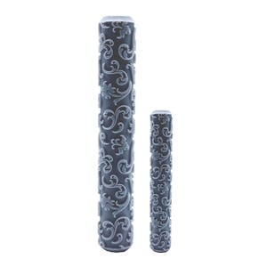 May include: Two gray rolling pins with a floral scroll design. The larger pin is approximately 7 inches long, and the smaller pin is about 3 inches long. Both are cylindrical and feature a repeating pattern of stylized flowers and vines.