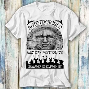 May include: White t-shirt with a black and white graphic design. The graphic features a stylized sun face with the text "Summerisle May Day Festival '73" and "Summer is icumen in".