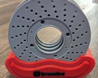Drinks mats in brake disc design – stylish storage in a brake caliper