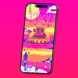 May include: A smartphone displays a pixelated retro arcade game scene with a vibrant pink and yellow sunset background. The screen shows the time 13:32, a level 5 arcade graphic, and a cityscape with a tower. The phone has a gold frame.