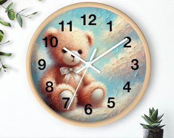 May include: A round wooden wall clock with a teddy bear illustration. The clock face has a blue and white sky background with white clouds. The numbers 1 through 12 are black and the clock hands are white.