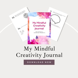 May include: A pink and blue watercolor background with the text "My Mindful Creativity Journal" and "365 Mindful Drawing Prompts". The image also shows a few pages from the journal with drawing prompts.