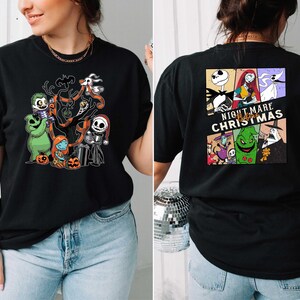 Puede incluir: Camiseta negra con un estampado gr&aacute;fico de personajes de la pel&iacute;cula "Pesadilla antes de Navidad". El gr&aacute;fico presenta a Jack Skellington, Sally y otros personajes de la pel&iacute;cula.